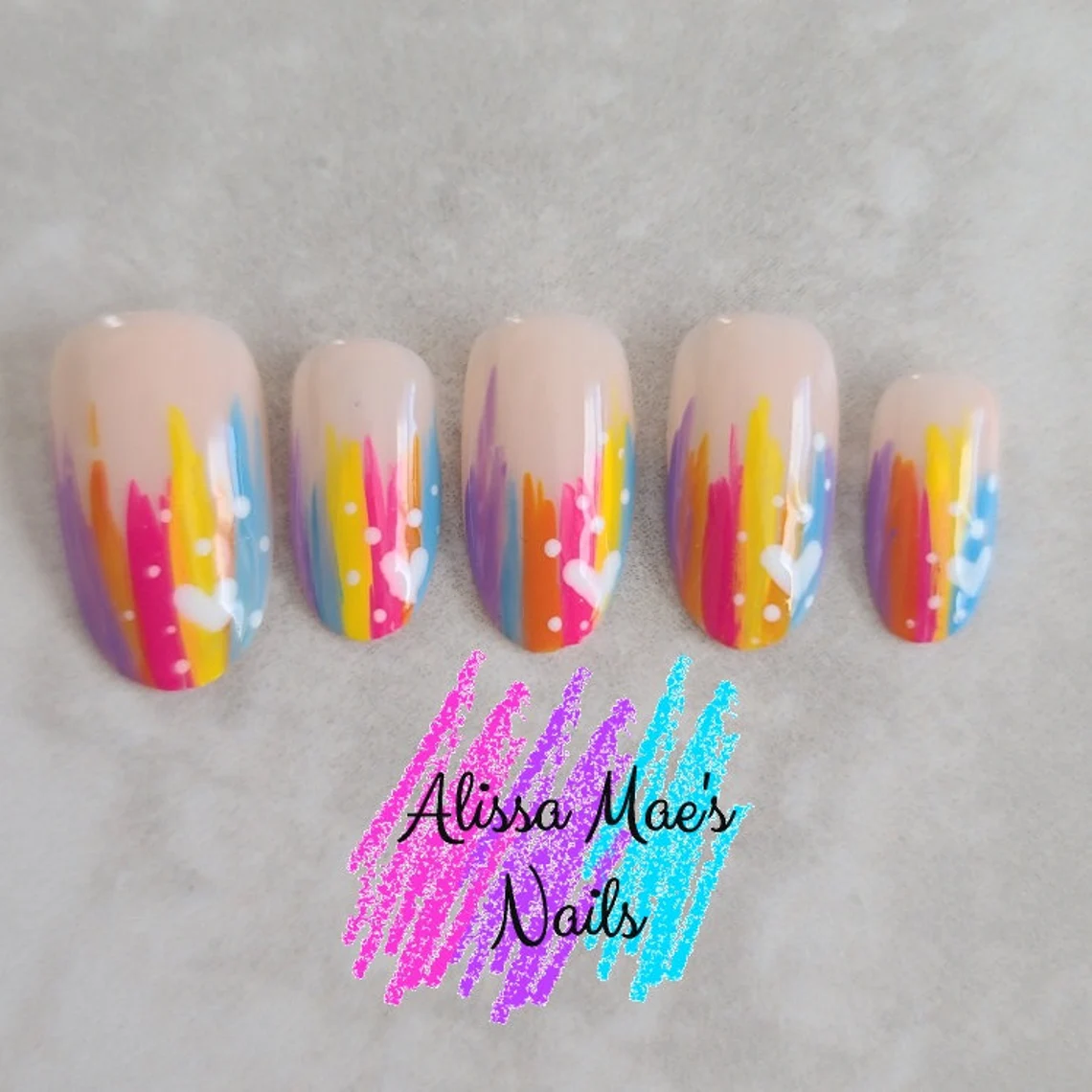 varied dot sizes polka dots nails