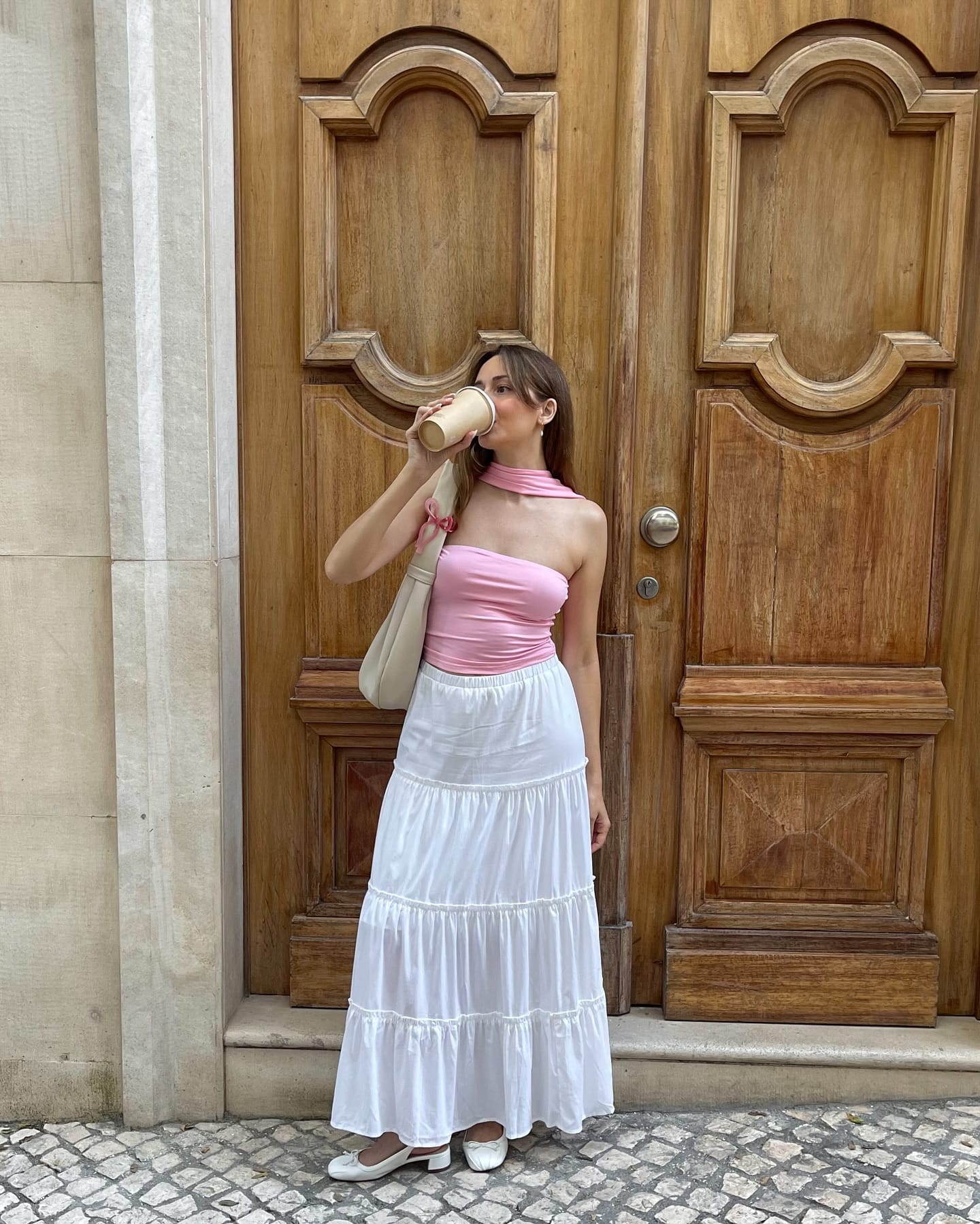 7. Pink Halter Top + White Tiered Skirt + Cream Bag